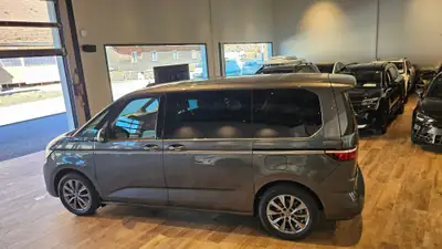 VW T7 Multivan 1.5 eHybrid Style 4Motion — Minibus hybride rechargeable, 7 places, quasi neuf — Thumbnail 16
