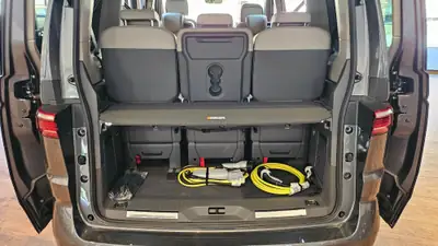 VW T7 Multivan 1.5 eHybrid Style 4Motion — Minibus hybride rechargeable, 7 places, quasi neuf — Thumbnail 21