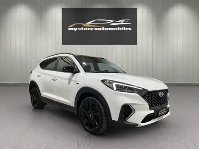 Hyundai Tucson 2.0 CRDI N-Line Mild Hybrid 4WD — SUV robuste, technologie hybride, 84'000 km — side view