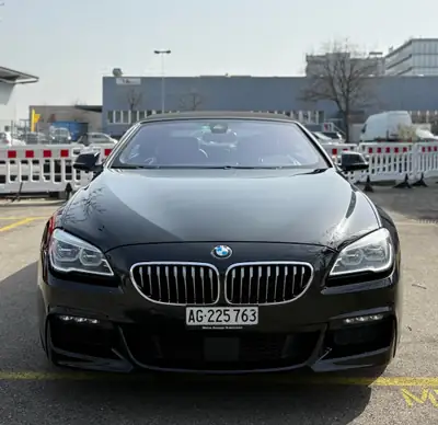 BMW 640i Cabrio xDrive — Cabriolet M Sportpaket, 320 ch et luxe à ciel ouvert — vista posteriore