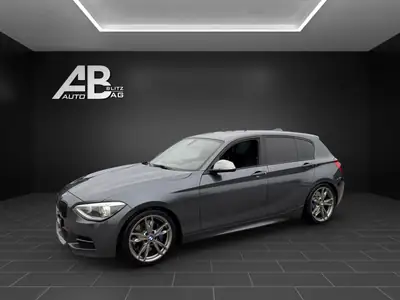 BMW M135i Steptronic — Berline sport 320 ch, entretien récent — côté