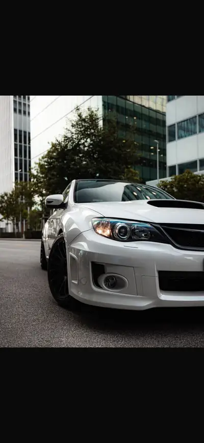 Subaru WRX STI Sport 2.5 Turbo 4WD — Berline sportive 301 ch, châssis KW, moins de 100 000 km — Heckansicht