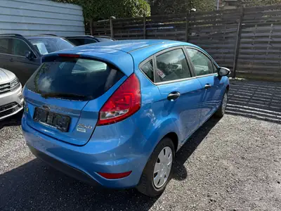 Ford Fiesta 1.25 16V Ambiente — Citadine fiable, climatisée et entretenue — intérieur