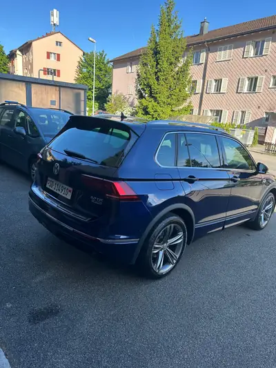 VW Tiguan 2.0 TDI SCR Highline — SUV robuste 4Motion, diesel économe — side view