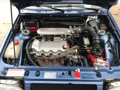 Ford Escort 1600 XR3i — Cabriolet des années 80, moteur sportif et faible kilométrage — cruscotto