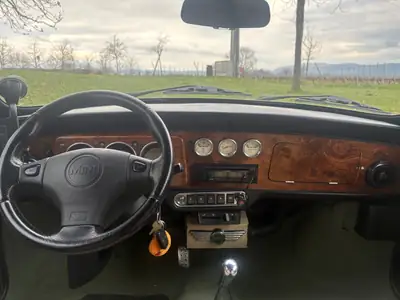MINI 1.3i — Icône compacte des années 90, économique et attachante — fianco