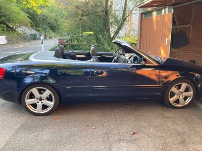 Audi A4 Cabriolet 3.0 TDI quattro S line — Élégance et performance diesel, toit ouvert — vue extérieure