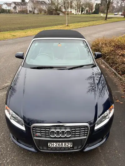 Audi A4 Cabriolet 3.0 TDI quattro S line — Élégance et performance diesel, toit ouvert — intérieur
