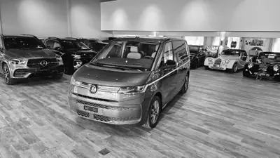 VW T7 Multivan 1.5 eHybrid Style 4Motion — Monospace hybride rechargeable, 2 km seulement — side view