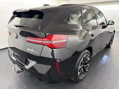 BMW X3 xDrive 48V 20d M Sport Pro — SUV premium diesel hybride, première main — rear view