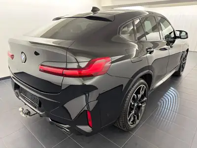 BMW X4 xDrive 48V M40d 2025 — SUV coupé diesel hybride, 6400 km, garantie constructeur — rear view