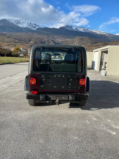 Jeep Wrangler TJ 2002 — Légende 4x4 violet, transmission manuelle, sans sinistre — interni