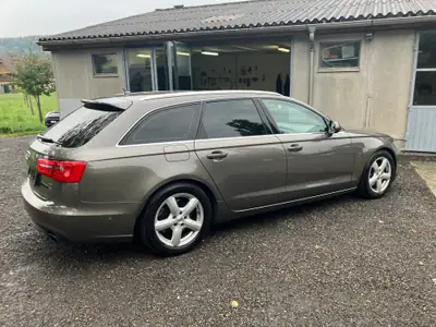 Audi A6 Avant 3.0 TFSI V6 quattro — Familiale premium, moteur V6 300 ch, transmission révisée — side view