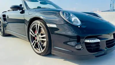 Porsche 911 Cabrio Turbo 2008 — Roadster haute performance avec tuning Sportec — côté