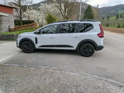 Dacia Jogger HEV 140 Extreme — Monospace hybride 7 places, faible kilométrage — Seitenansicht