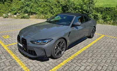BMW M4 Competition Cabrio xDrive — Roadster haute performance, 50'100 km seulement — Seitenansicht