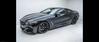 BMW M850i xDrive — Coupé sport 530 ch, prestations M exceptionnelles — vista posteriore
