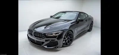 BMW M850i xDrive — Coupé sport 530 ch, prestations M exceptionnelles — fianco