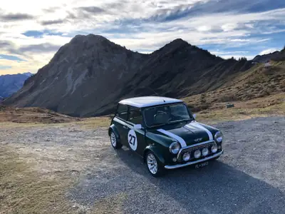 MINI Cooper 1.3i — Classique britannique 1998, British Racing Green, rare et authentique — fianco