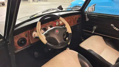 MINI Cooper 1.3i — Classique britannique 1998, British Racing Green, rare et authentique — cruscotto