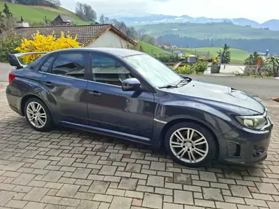 Subaru WRX STI 2.5 Turbo 4WD — Sportive légendaire, transmission manuelle authentique — rear view