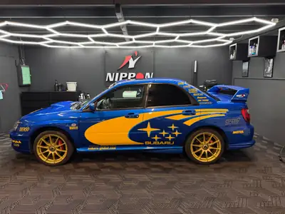 Subaru Impreza WRX 2.0 Turbo 4WD — Berline sportive iconique, rallye optik, frais contrôle technique — interior