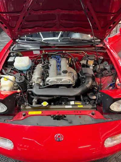 Mazda MX-5 1.8i-16 1995 — Roadster légendaire en état de collection, kilométrage préservé — Thumbnail 10