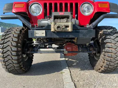 Jeep Wrangler 4.0 Sport S.Top 1997 — Le SUV légendaire, 177 ch et seulement 65'200 km — vista posteriore