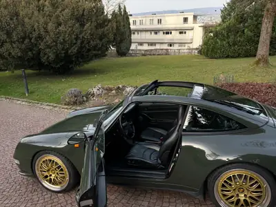Porsche 911 Targa 1997 — Roadster iconique vert British Racing, châssis neuf — arrière