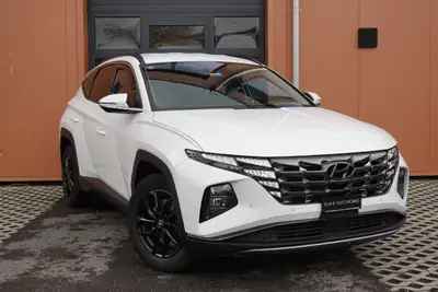 Hyundai Tucson 1.6 TGDI HEV Amplia 4WD — SUV hybride essence, 8 roues, seulement 138 500 km — vista esterna