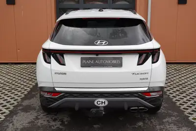 Hyundai Tucson 1.6 TGDI HEV Amplia 4WD — SUV hybride essence, 8 roues, seulement 138 500 km — Miniatura 8