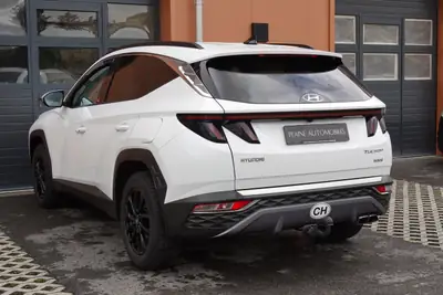 Hyundai Tucson 1.6 TGDI HEV Amplia 4WD — SUV hybride essence, 8 roues, seulement 138 500 km — Miniatura 9