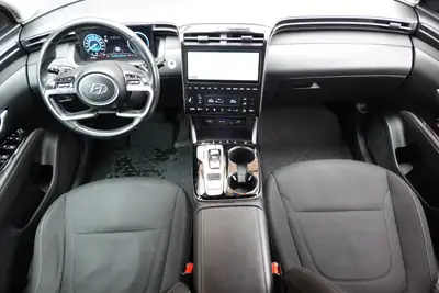 Hyundai Tucson 1.6 TGDI HEV Amplia 4WD — SUV hybride essence, 8 roues, seulement 138 500 km — Miniatura 12