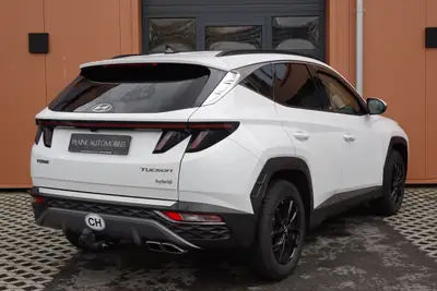 Hyundai Tucson 1.6 TGDI HEV Amplia 4WD — SUV hybride essence, 8 roues, seulement 138 500 km — Miniatura 10