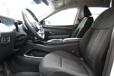 Hyundai Tucson 1.6 TGDI HEV Amplia 4WD — SUV hybride essence, 8 roues, seulement 138 500 km — Miniatura 29
