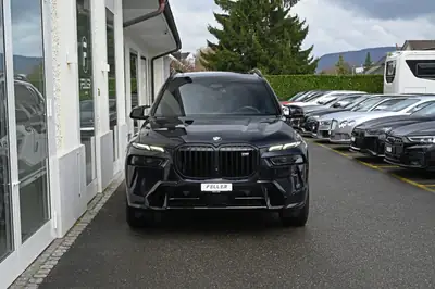 BMW X7 xDrive M60i — SUV 7 places premium, V8 530 ch, 50'000 km — side view
