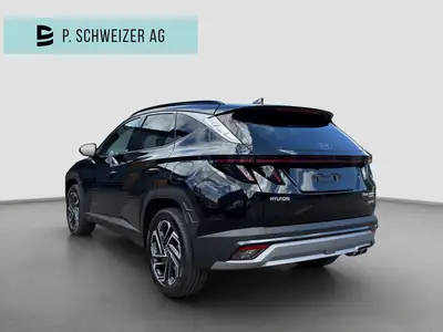 Hyundai Tucson 1.6 TGDI HEV Swiss Edition 4WD — SUV hybride essence, 15 km seulement — arrière