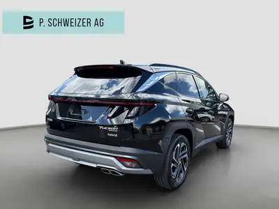 Hyundai Tucson 1.6 TGDI HEV Swiss Edition 4WD — SUV hybride essence, 15 km seulement — tableau de bord