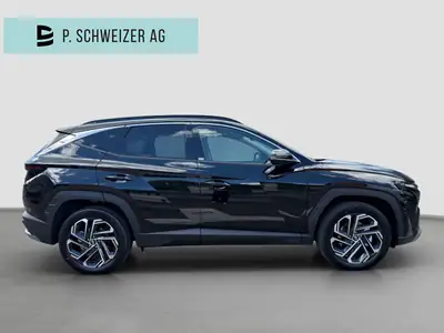 Hyundai Tucson 1.6 TGDI HEV Swiss Edition 4WD — SUV hybride essence, 15 km seulement — détail