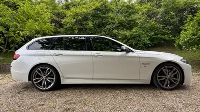 BMW M550d Touring xDrive — Diesel performant, break luxe 381 ch — Seitenansicht