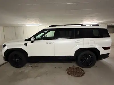 Hyundai Santa Fe 1.6 T-GDi PHEV Calligraphy — SUV 7 places hybride rechargeable, 25'000 km — side view