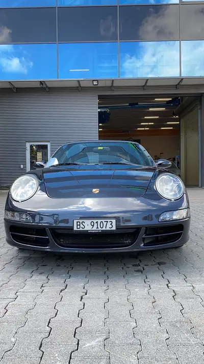 Porsche 911 Carrera 4S — Sportive iconique, transmission automatique, 169 000 km — côté