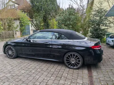 Mercedes-Benz C 200 AMG Line Cabriolet 4Matic — Décapotable élégante, motorisation hybride légère — côté