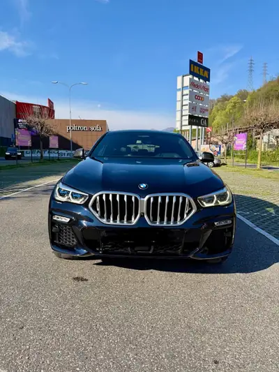 BMW X6 xDrive 30d M Sport — SUV coupé puissant, hybride 48V et entretien réduit — Heckansicht