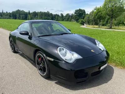 Porsche 911 Carrera 4 S — Coupé sportif légendaire, 320 ch et transmission manuelle — Miniatura 7