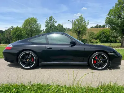Porsche 911 Carrera 4 S — Coupé sportif légendaire, 320 ch et transmission manuelle — Miniatura 9