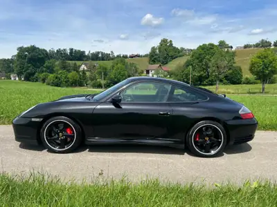 Porsche 911 Carrera 4 S — Coupé sportif légendaire, 320 ch et transmission manuelle — Miniatura 12