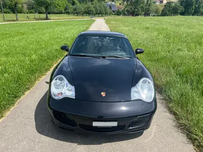 Porsche 911 Carrera 4 S — Coupé sportif légendaire, 320 ch et transmission manuelle — Miniatura 11