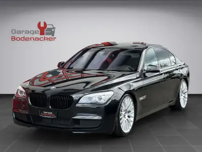 BMW 740d M Sport — Berline prestige diesel, entretien récent, 21 pouces — side view