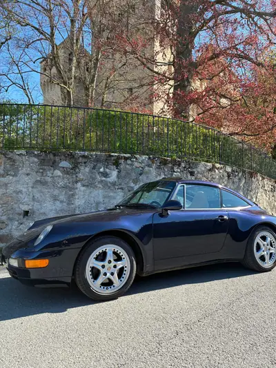 Porsche 911 Targa 993 — Chef-d'œuvre cabriolet des années 90, 286 ch et boîte manuelle — côté
